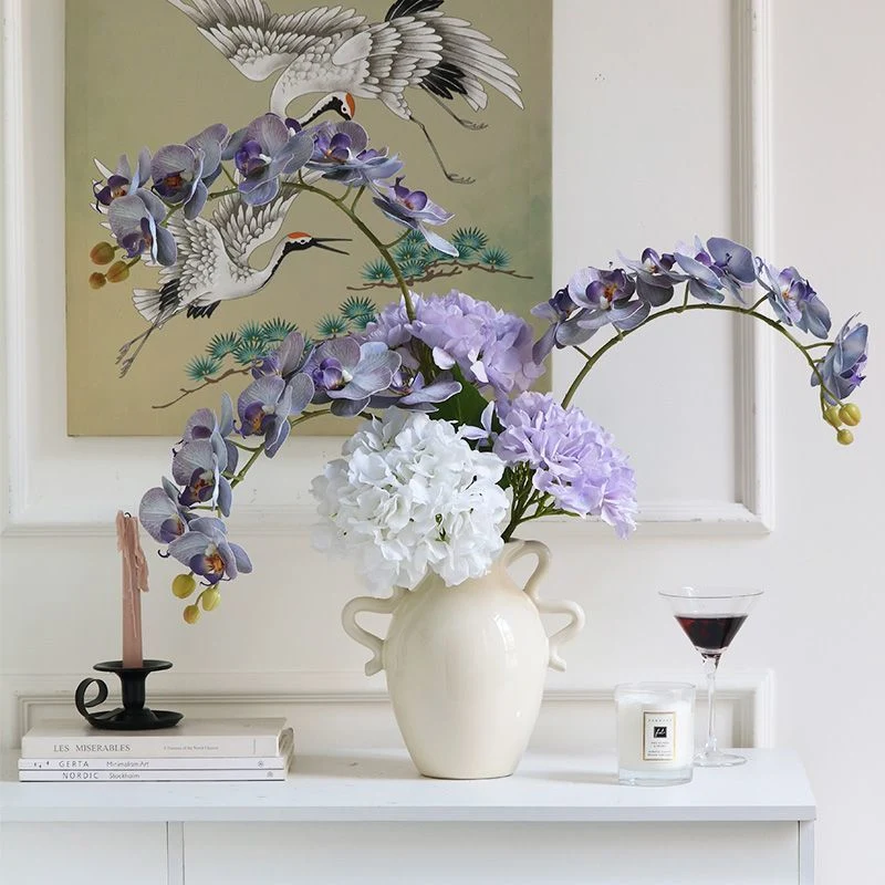 Lebensechte künstliche Orchideenarrangement