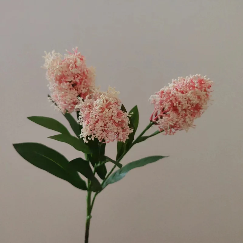 Lebensechte Blumenstängelarrangement