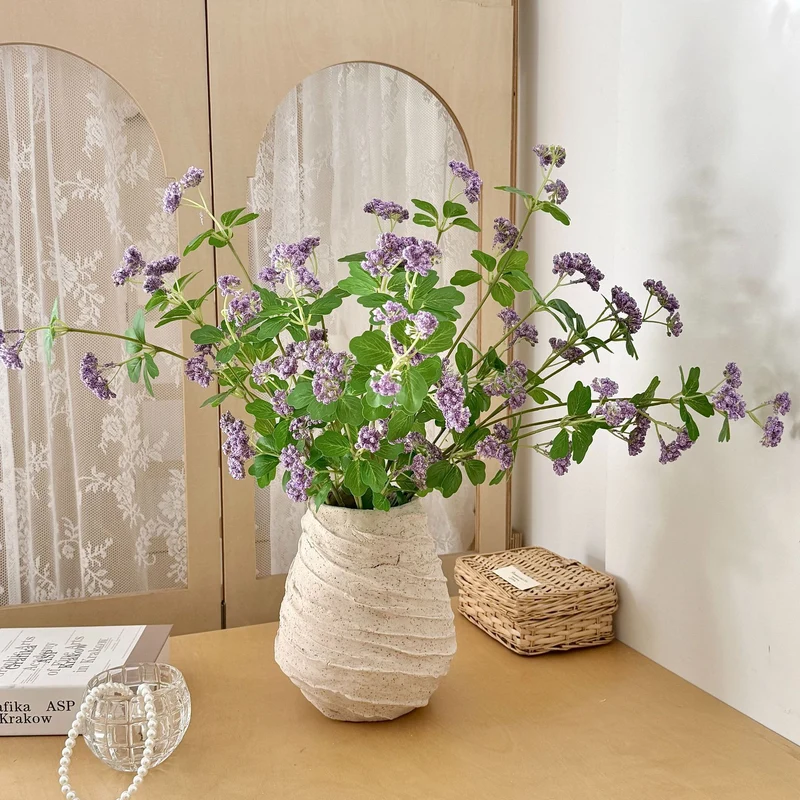 Künstlicher Blütenzweig mit lila Blüten Karnz