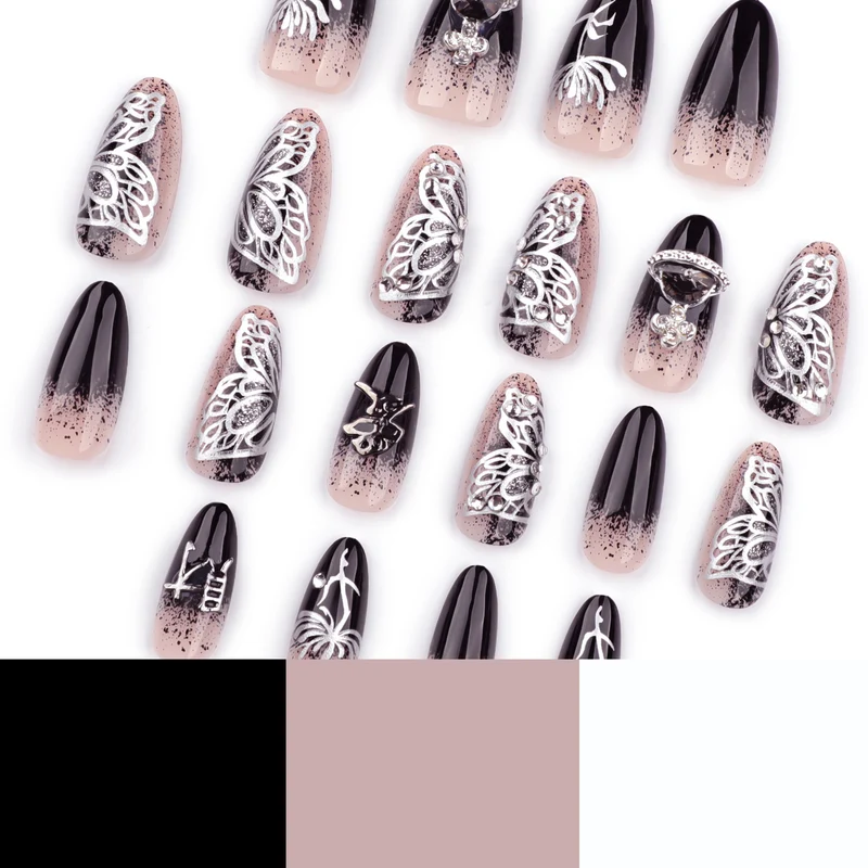 Kunstvolle Stiletto-Nägel mit filigranen Verzierungen und Glamour-Akzenten Karnz