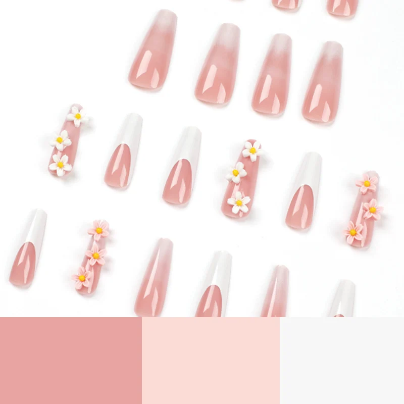Kunstvolle Nagelverlängerungen mit elegantem Farbverlauf und kreativen Blumenakzenten Karnz