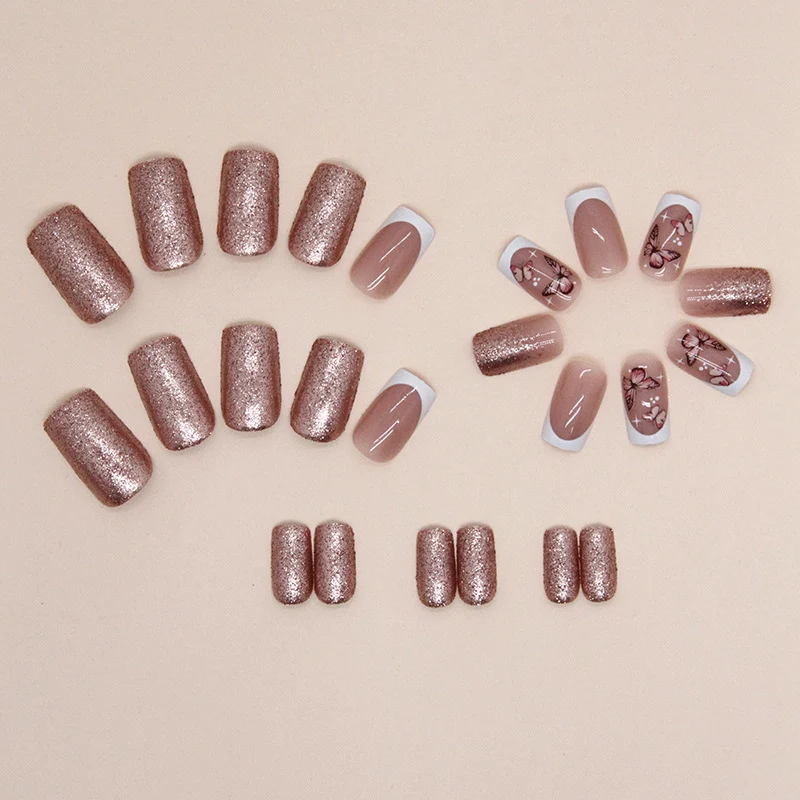 Dekorative Schmetterling- und Glitter-Nagelkunst Karnz