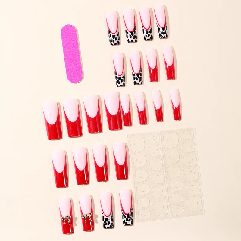 Stylische Acryl-Nagelerweiterungen mit Schleife und Leopardenmuster Karnz