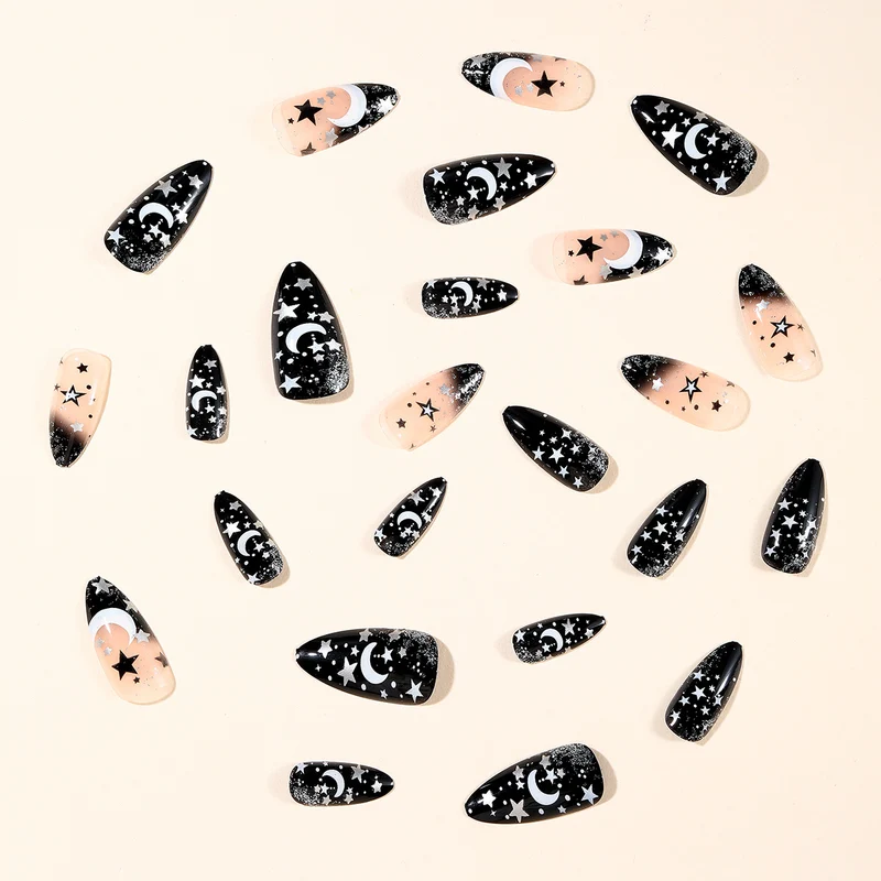 Stiletto Nagelkunstverlängerungen mit himmlischem Design Karnz